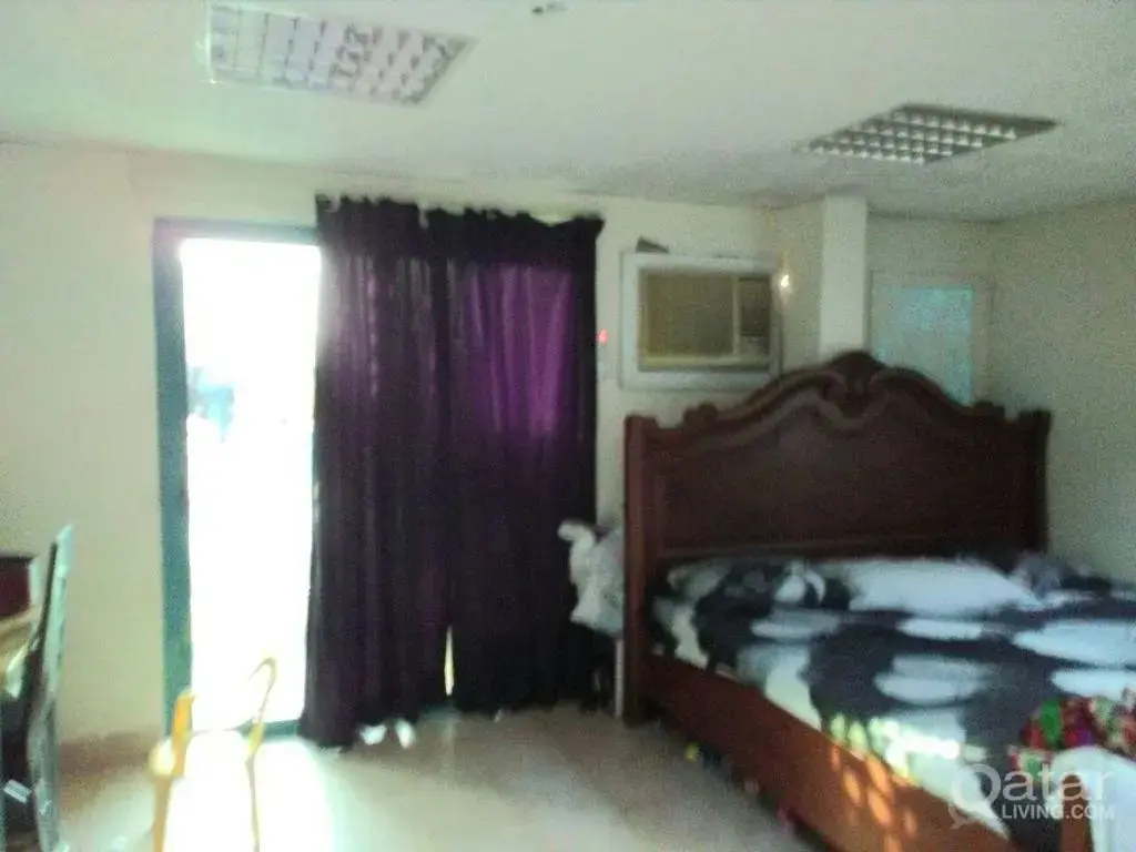 Furnished studio with balcony for family At Umm Ghuwailina, near metro station.